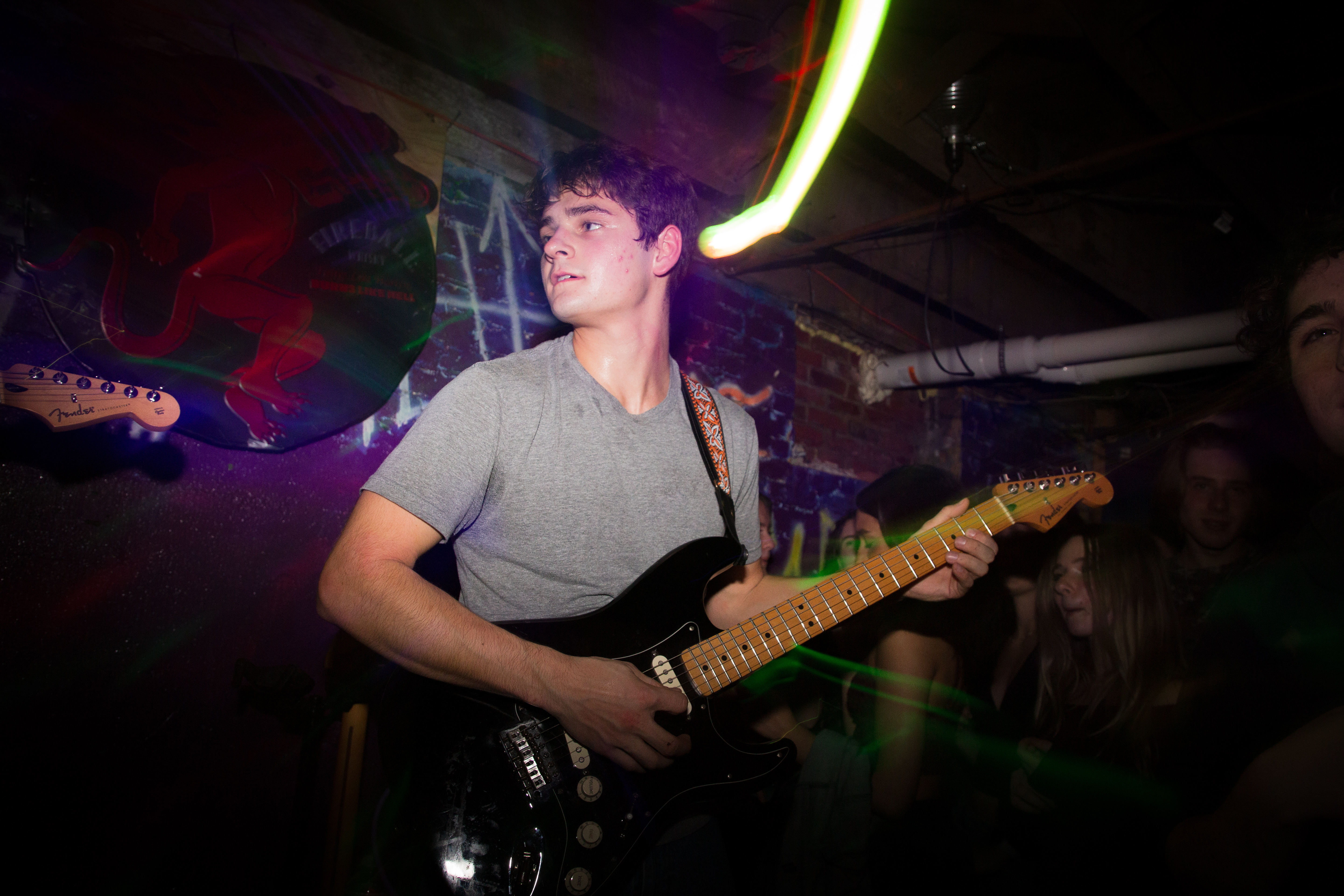 A man playing the guitar.